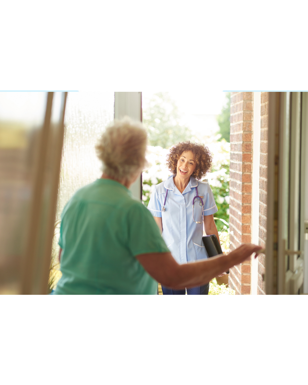 A patient opening the door for a home health care professional.